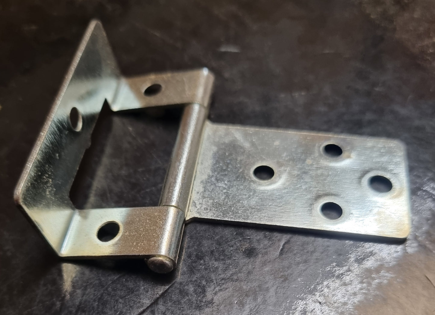 Cranked Flush Hinge 50mm Zinc Plated sold as a pair. Internal furniture hinge