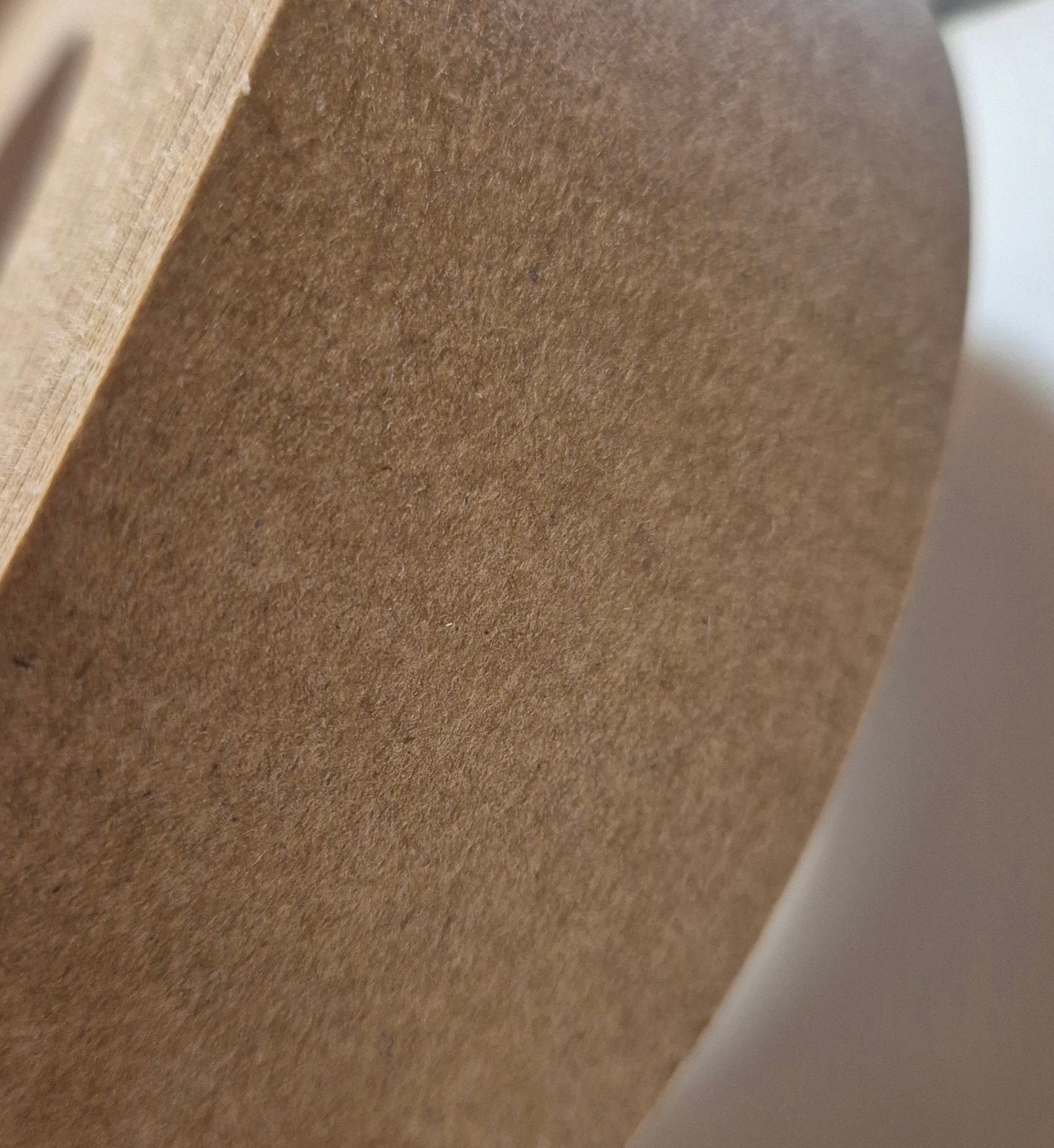 Paintable iron on edging tape for MDF or melamine boards. Can be trimmed to size. MDF edging tape