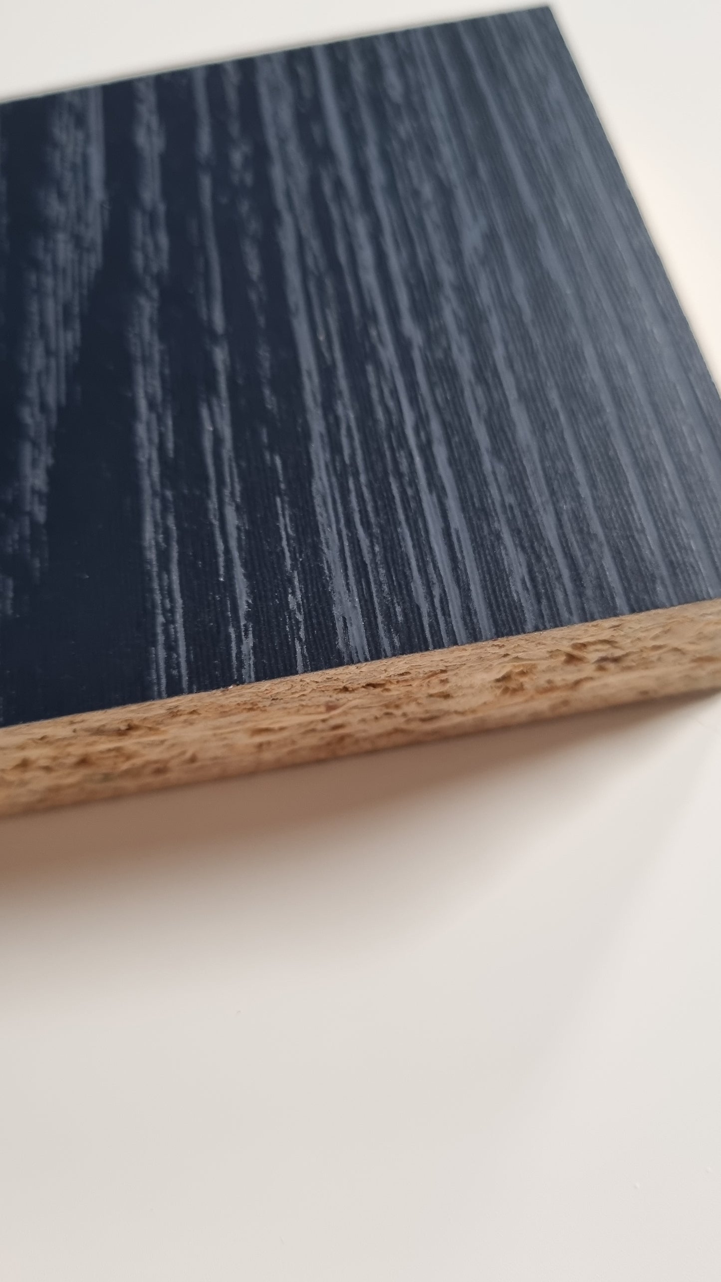 Indigo blue woodgrain shelving, furniture or end panel board. 18mm thick decorative melamine